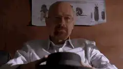 Walter White holding a hat