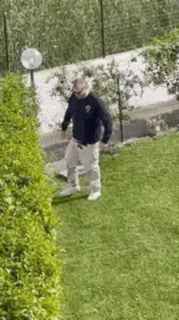 Man runs and jumps down stairs