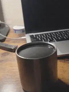 steaming mug on desk
