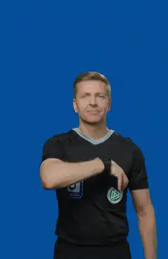 Referee shows yellow card