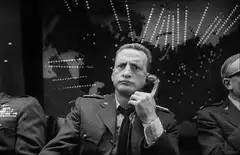 Dr. Strangelove holding phone receiver