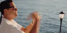 Leonardo DiCaprio throwing money