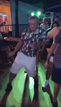 Man dancing on light-up floor