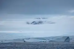 Iceberg and mountain in Antarctica