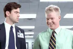 Dwight and Jim laughing in the office