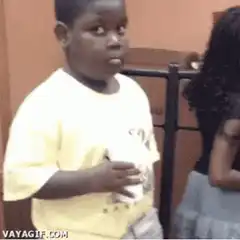 Young boy looking skeptical