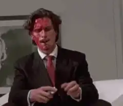 Patrick Bateman lights cigarette with bloody face