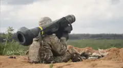 Soldier fires rocket launcher