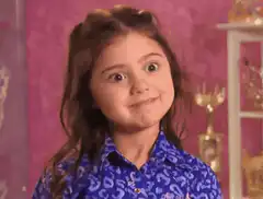 Girl smirking and looking sideways