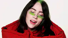 Billie Eilish smiling and laughing