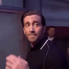 Jake Gyllenhaal blowing a kiss and walking away
