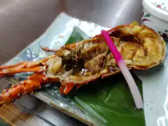 grilled lobster tail on plate