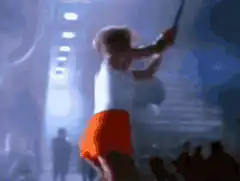 Conductor hits giant face on screen