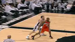 Manu Ginobili spins past defender