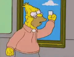 Homer Simpson holding a piece of paper
