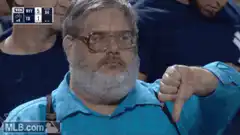 Baseball fan gives thumbs down