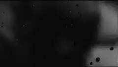 dark abstract shapes and particles