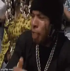 Eminem nodding and gesturing