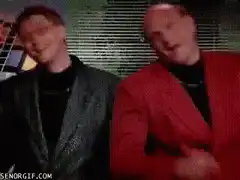 Two men laughing and dancing
