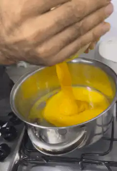 Pouring Ostrich Egg Yolk