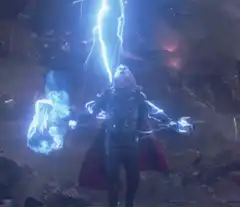 Thor summons lightning and blasts energy