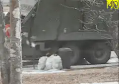 Garbage man throws trash can