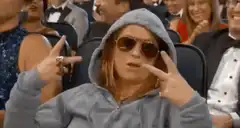 Sandra Oh peace signs at awards show