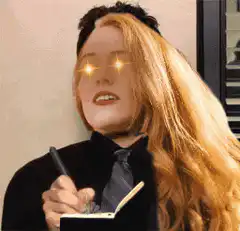 Leslie Knope writing with glowing eyes