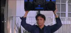 Tony Montana holding boombox