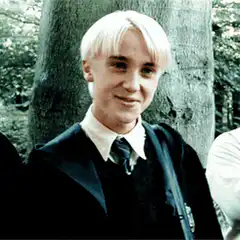 Tom Felton as Draco Malfoy smiling