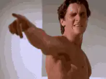Patrick Swayze pointing and laughing