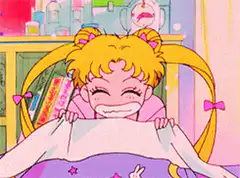 Sailor Chibi Moon excitedly peeks over blanket