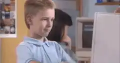 Blonde boy gives thumbs up