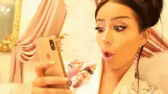 Woman shocked by phone