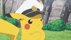 Pikachu eating food from a spoon