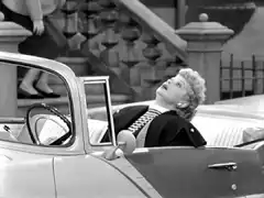 Lucy Ricardo in a convertible car