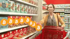 woman shopping with bitcoin emojis