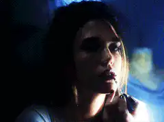Jennifer Connelly with a syringe