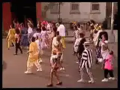 people dancing in colorful costumes