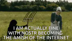 Amish person with pitchfork and text