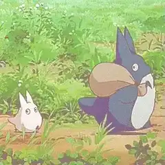 Totoro and Chibi Totoro in the grass