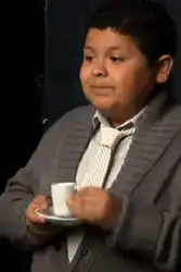 Rico Rodriguez sips tea