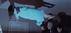 Regan levitating on ceiling