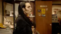 Nosferatu stares at coworkers