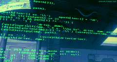 Matrix code rain on monitor