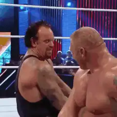 The Undertaker screams at Brock Lesnar
