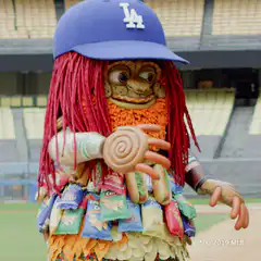 Wally the Green Monster waving