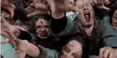 Zombie horde reaching out