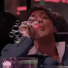 Tom Hanks blowing bubbles