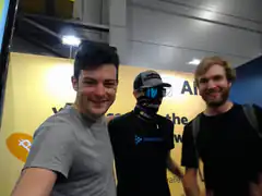 Three men at a Bitcoin event